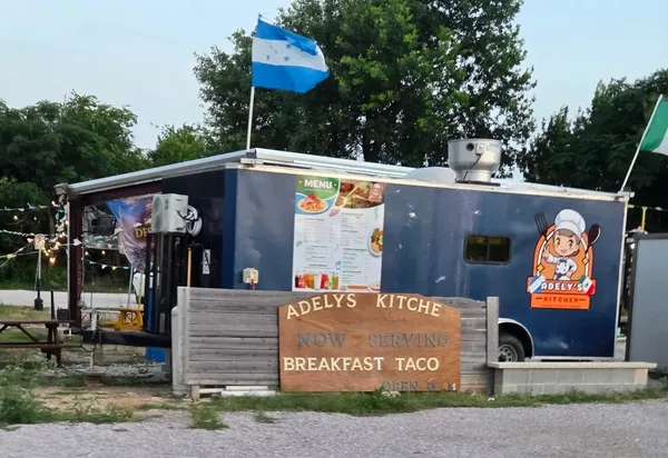 Honduran flag, blue truck, Adely's Kitchen, breakfast tacos at 6 AM