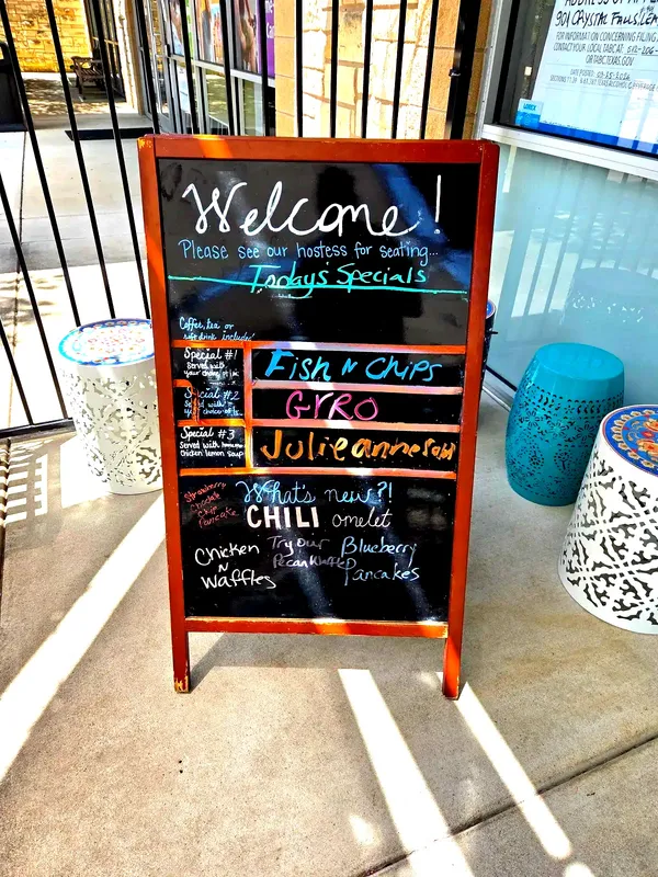 Todays Specials board: fish, gyros, chili omelets. Leander's morning, unexpected choices