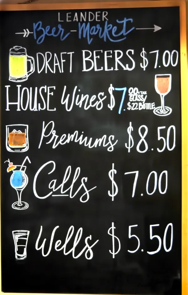 Leander Beer Market chalkboard. Seven dollar drafts, five dollar wells, no fuss